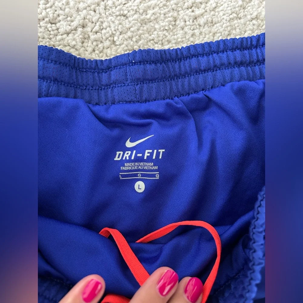 Women's Nike Dri-fit shorts Blue, black and orange details size L